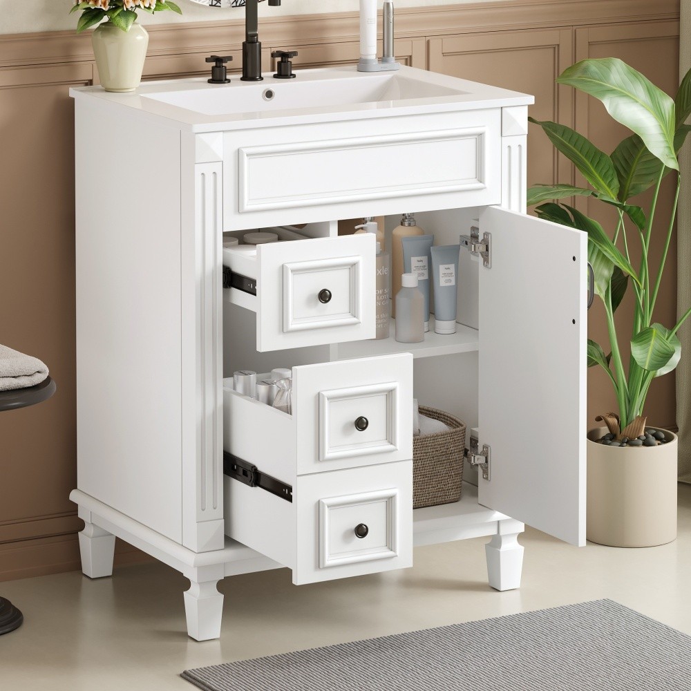 Bathroom vanity W ceramic sink Features two drawers Includes adjustable shelves