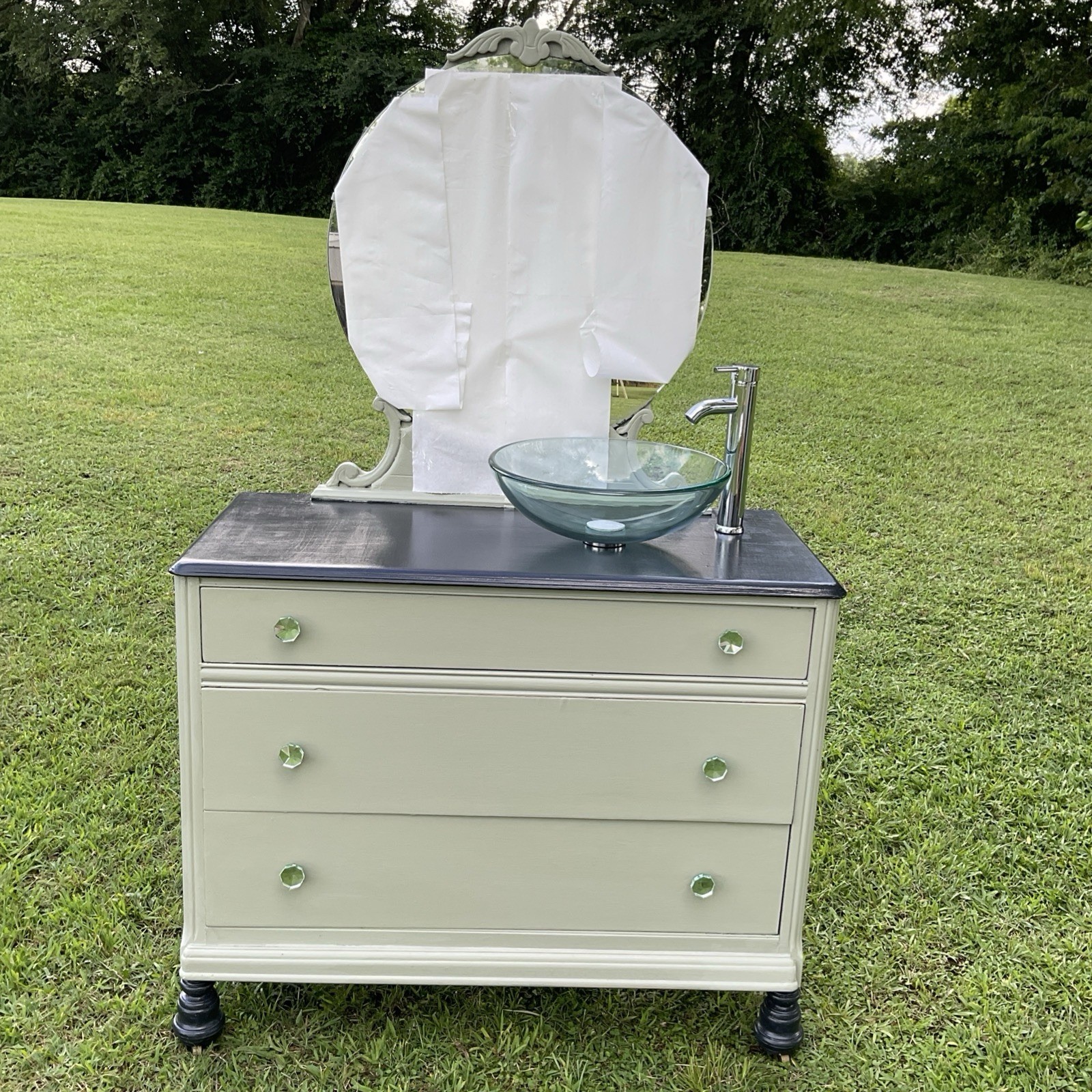 Green & Gray Dresser Repurposed Into Bathroom Vanity With Clear Glass Sink