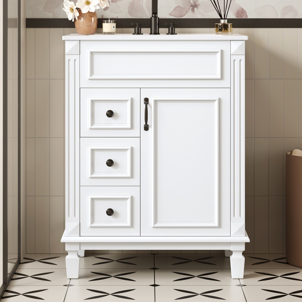 Bathroom vanity W ceramic sink Features two drawers Includes adjustable shelves