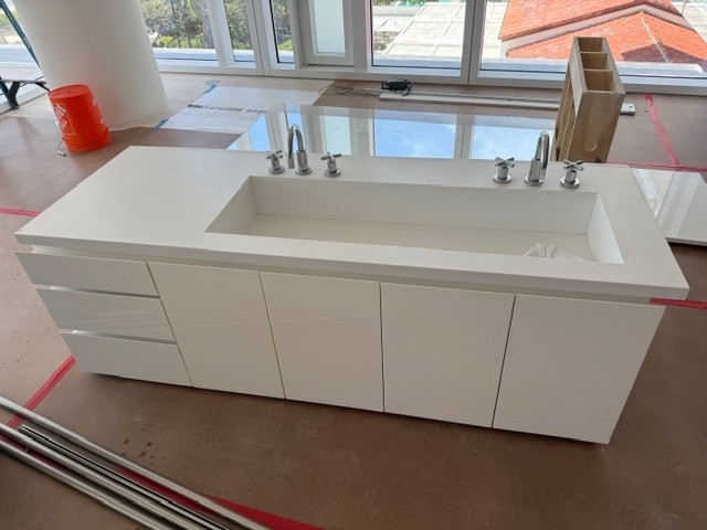 bathroom vanity with sink and faucet