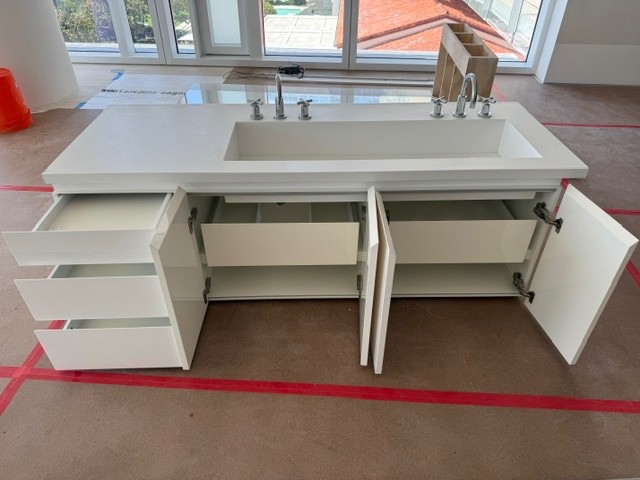 bathroom vanity with sink and faucet