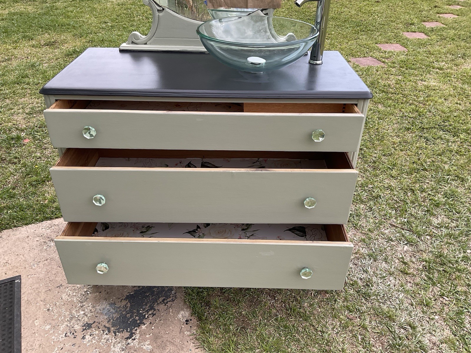 Green & Gray Dresser Repurposed Into Bathroom Vanity With Clear Glass Sink