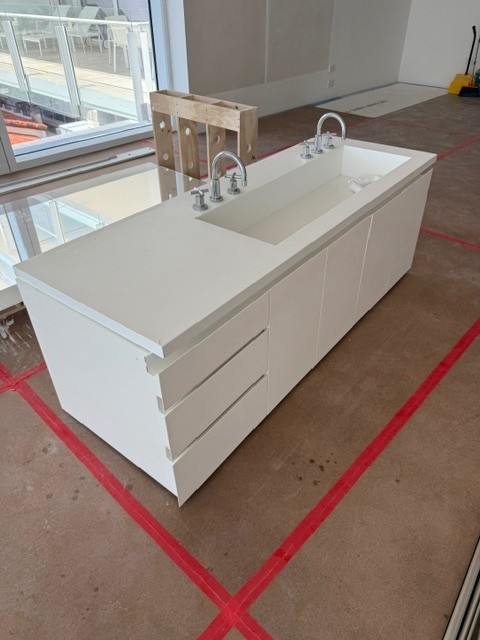 bathroom vanity with sink and faucet