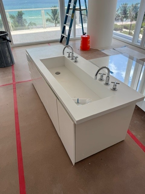 bathroom vanity with sink and faucet
